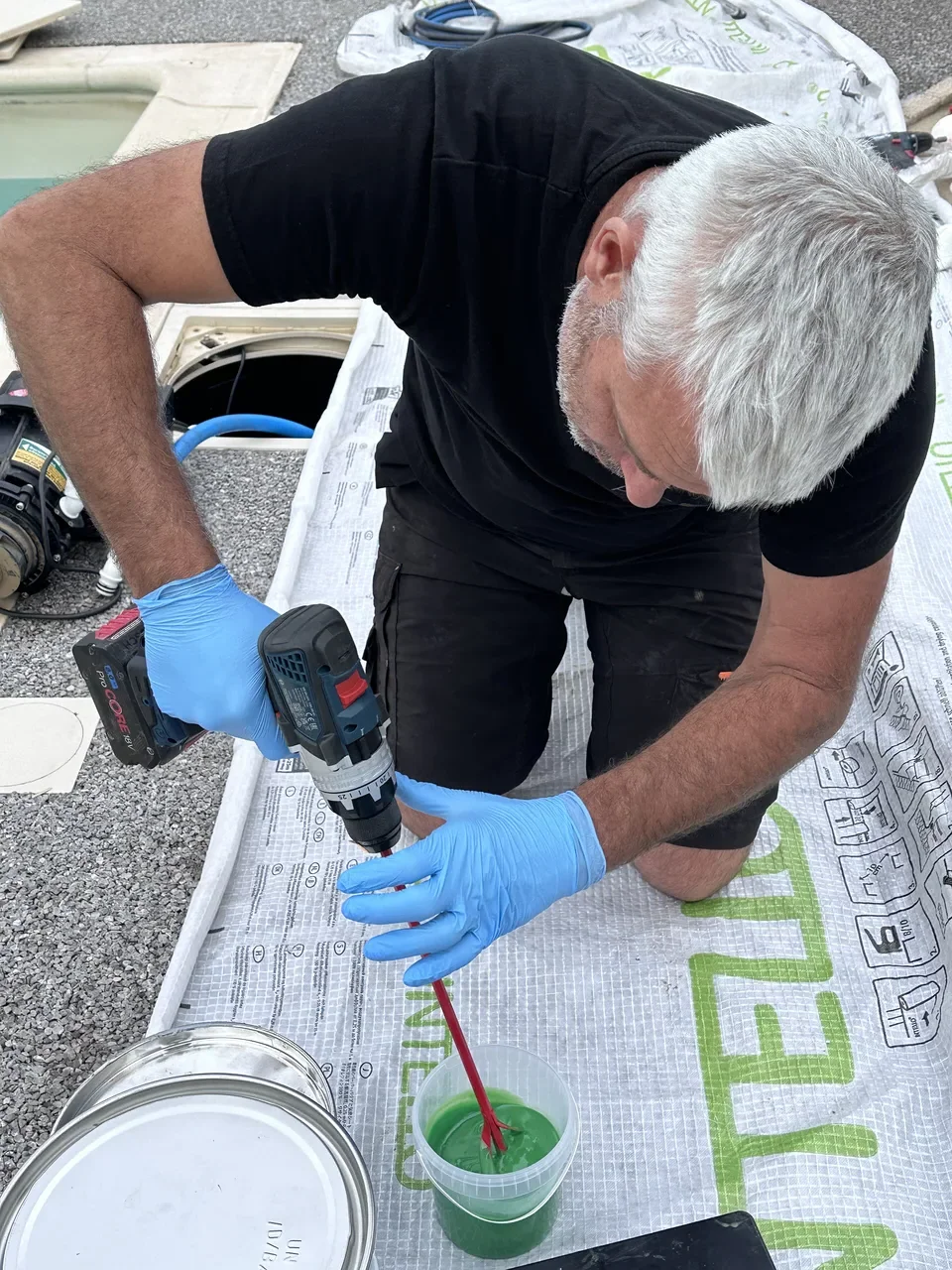 Perceuse gros plan — ARC Assainissement